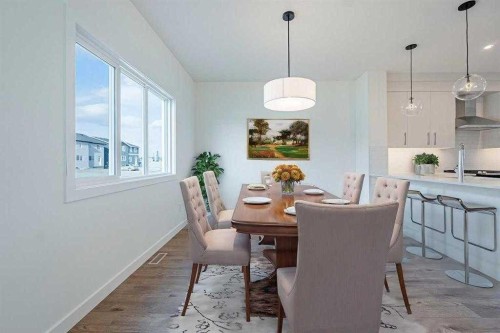 129 Dawson Wharf View, Chestermere, AB - Indoor Photo Showing Dining Room