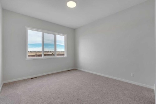 63 Bartlett Crescent Se, Calgary, AB - Indoor Photo Showing Other Room