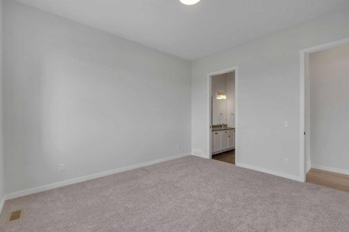 63 Bartlett Crescent Se, Calgary, AB - Indoor Photo Showing Other Room