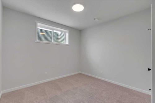 63 Bartlett Crescent Se, Calgary, AB - Indoor Photo Showing Other Room