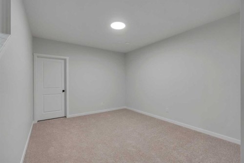 63 Bartlett Crescent Se, Calgary, AB - Indoor Photo Showing Other Room