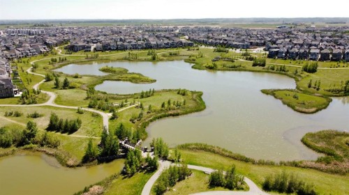 121-402 Marquis Lane Se, Calgary, AB - Outdoor With Body Of Water With View