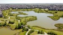 121-402 Marquis Lane Se, Calgary, AB  - Outdoor With Body Of Water With View 