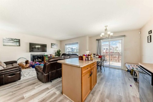 151 Covepark Green Ne, Calgary, AB - Indoor With Fireplace
