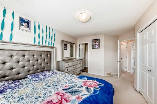 151 Covepark Green Ne, Calgary, AB - Indoor Photo Showing Bedroom