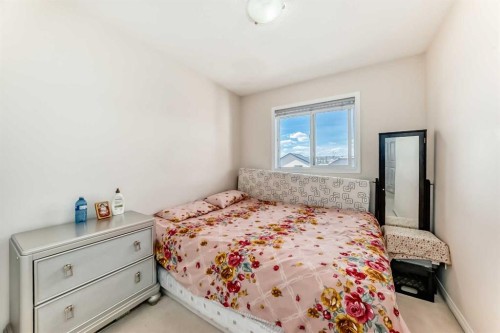 151 Covepark Green Ne, Calgary, AB - Indoor Photo Showing Bedroom