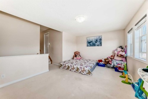 151 Covepark Green Ne, Calgary, AB - Indoor Photo Showing Bedroom