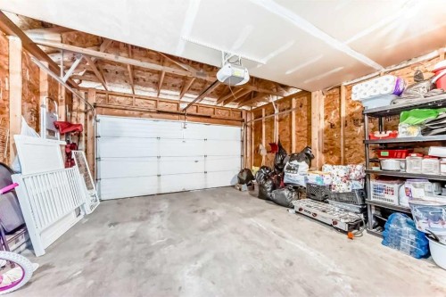 151 Covepark Green Ne, Calgary, AB - Indoor Photo Showing Garage