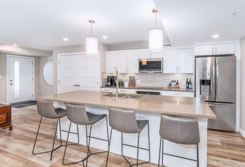 103-810 7Th Street, Canmore, AB - Indoor Photo Showing Kitchen With Double Sink With Upgraded Kitchen
