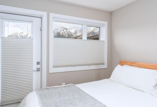 103-810 7Th Street, Canmore, AB - Indoor Photo Showing Bedroom
