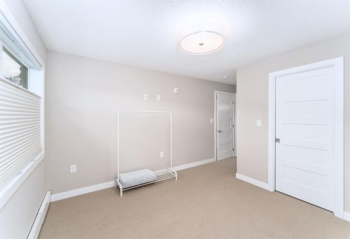 103-810 7Th Street, Canmore, AB - Indoor Photo Showing Other Room
