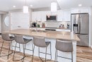 103-810 7Th Street, Canmore, AB  - Indoor Photo Showing Kitchen With Double Sink With Upgraded Kitchen 
