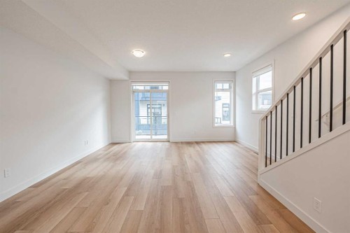 101-550 Seton Circle Se, Calgary, AB - Indoor Photo Showing Other Room