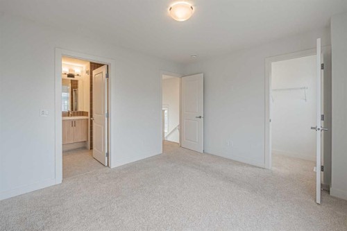 101-550 Seton Circle Se, Calgary, AB - Indoor Photo Showing Other Room