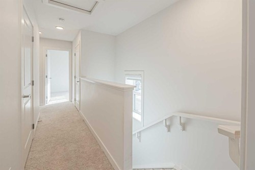 101-550 Seton Circle Se, Calgary, AB - Indoor Photo Showing Other Room