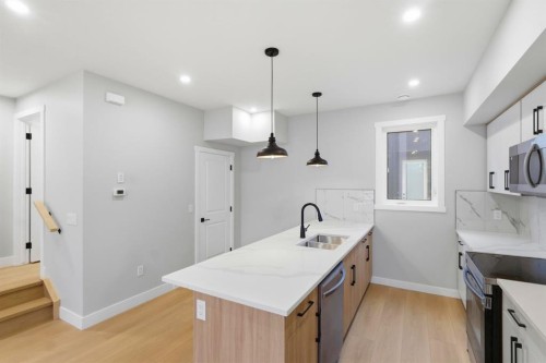 1636 19 Avenue Nw, Calgary, AB - Indoor Photo Showing Kitchen With Double Sink