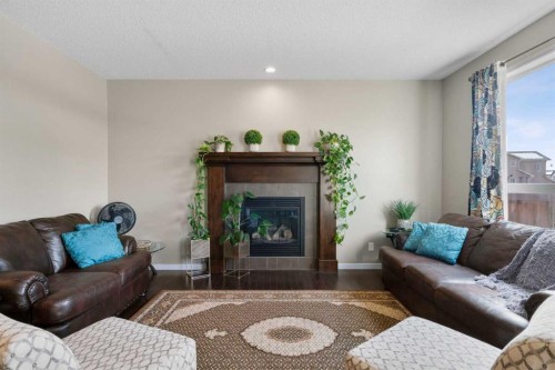 12 Brightoncrest Manor, Calgary, AB - Indoor Photo Showing Living Room With Fireplace