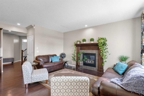 12 Brightoncrest Manor, Calgary, AB - Indoor Photo Showing Living Room With Fireplace