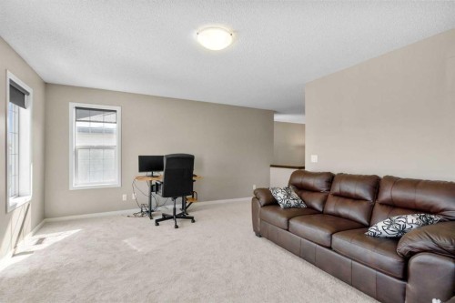 12 Brightoncrest Manor, Calgary, AB - Indoor Photo Showing Living Room