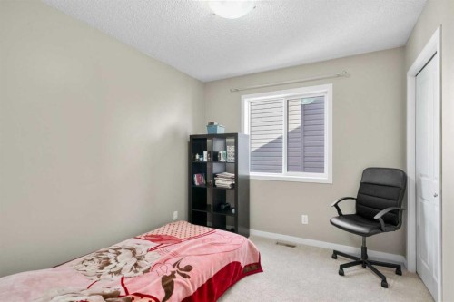 12 Brightoncrest Manor, Calgary, AB - Indoor Photo Showing Bedroom