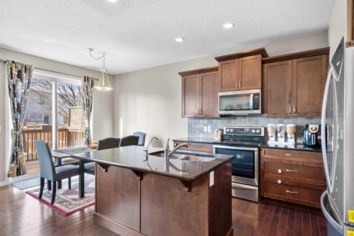 12 Brightoncrest Manor, Calgary, AB - Indoor Photo Showing Kitchen With Double Sink
