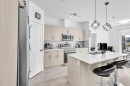 305-30 Sage Hill Walk Nw, Calgary, AB  - Indoor Photo Showing Kitchen With Double Sink 