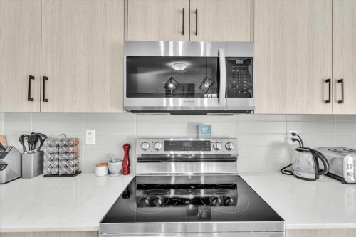 305-30 Sage Hill Walk Nw, Calgary, AB - Indoor Photo Showing Kitchen