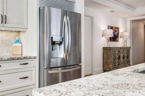 306-131 Quarry Way Se, Calgary, AB - Indoor Photo Showing Kitchen
