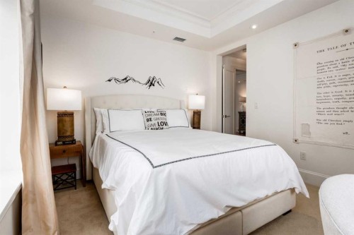 306-131 Quarry Way Se, Calgary, AB - Indoor Photo Showing Bedroom