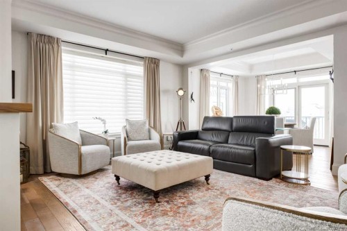 306-131 Quarry Way Se, Calgary, AB - Indoor Photo Showing Living Room