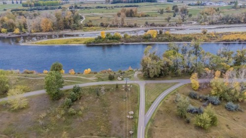 306-131 Quarry Way Se, Calgary, AB - Outdoor With Body Of Water With View