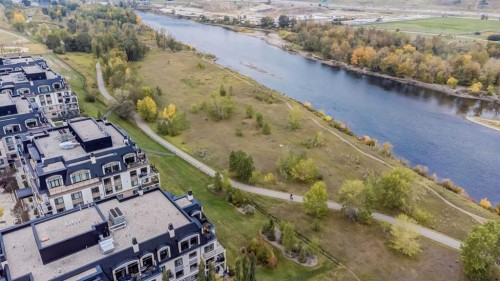 306-131 Quarry Way Se, Calgary, AB - Outdoor With Body Of Water With View