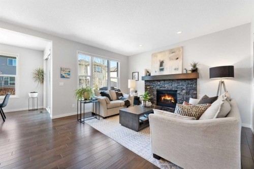 92 Brightoncrest Point Se, Calgary, AB - Indoor Photo Showing Living Room With Fireplace