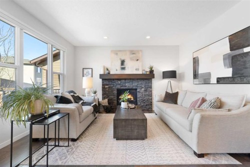 92 Brightoncrest Point Se, Calgary, AB - Indoor Photo Showing Living Room With Fireplace