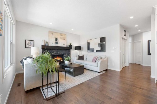 92 Brightoncrest Point Se, Calgary, AB - Indoor Photo Showing Living Room With Fireplace