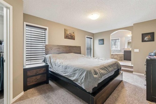 117 Silverado Saddle Heights Sw, Calgary, AB - Indoor Photo Showing Bedroom