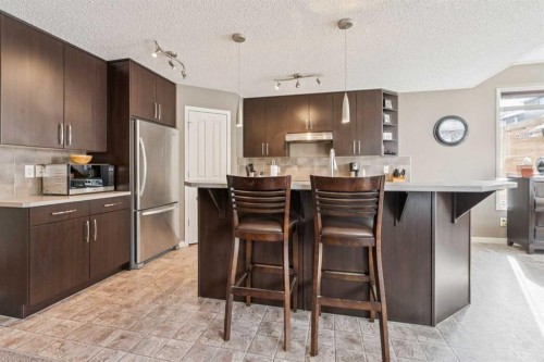 117 Silverado Saddle Heights Sw, Calgary, AB - Indoor Photo Showing Kitchen With Upgraded Kitchen