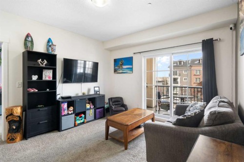 3317-99 Copperstone Park Se, Calgary, AB - Indoor Photo Showing Living Room