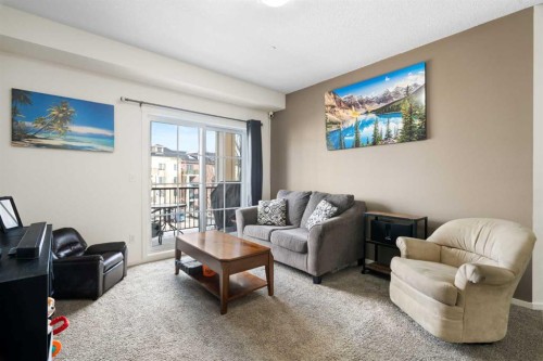 3317-99 Copperstone Park Se, Calgary, AB - Indoor Photo Showing Living Room