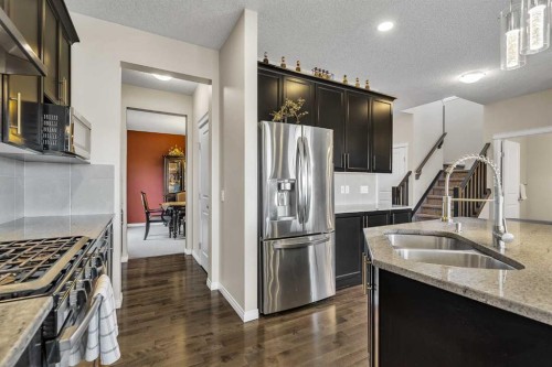 87 Panton Landing Nw, Calgary, AB - Indoor Photo Showing Kitchen With Double Sink With Upgraded Kitchen