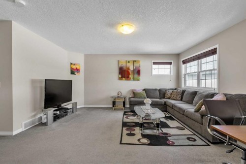 87 Panton Landing Nw, Calgary, AB - Indoor Photo Showing Living Room