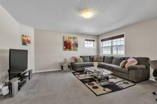 87 Panton Landing Nw, Calgary, AB - Indoor Photo Showing Living Room