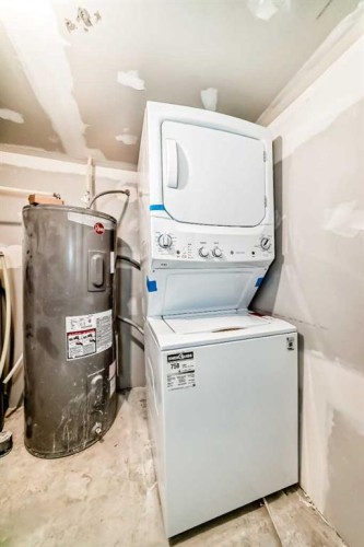 264 99 Avenue Se, Calgary, AB - Indoor Photo Showing Laundry Room
