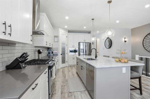 111 Crestridge View Sw, Calgary, AB - Indoor Photo Showing Kitchen With Upgraded Kitchen