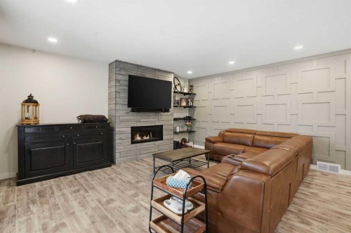 111 Crestridge View Sw, Calgary, AB - Indoor With Fireplace