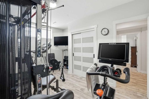 111 Crestridge View Sw, Calgary, AB - Indoor Photo Showing Gym Room