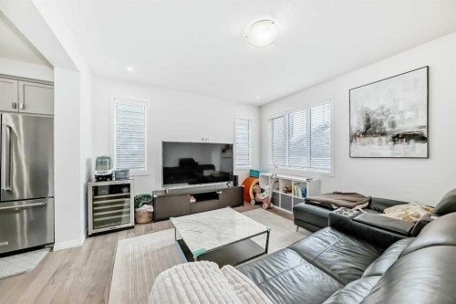 372 Carrington Way Nw, Calgary, AB - Indoor Photo Showing Living Room