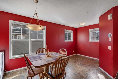 320 Elgin Gardens Se, Calgary, AB - Indoor Photo Showing Dining Room