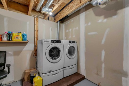 320 Elgin Gardens Se, Calgary, AB - Indoor Photo Showing Laundry Room