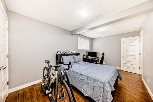 612 Montgomery Close Se, High River, AB - Indoor Photo Showing Bedroom